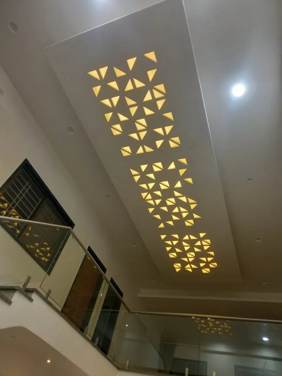 a ceiling with beautiful pop design showing best interior design pune