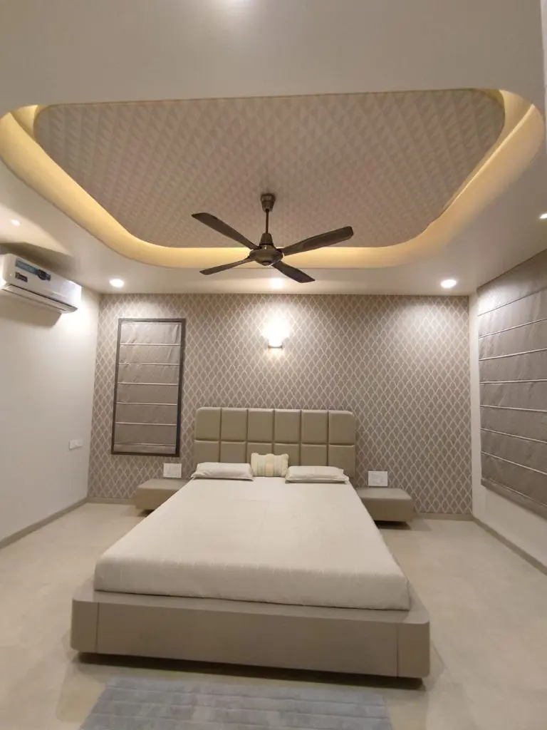 a bedroom with white combination showing best interior design pune